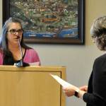Sequim Gazette photo by Matthew Nash
Acting city clerk Heather Robley, right, swears in new city councilor Nicole Hartman on April 22 after she was appointed to fill former mayor Tom Ferrells seat. Shell serve through certification of the 2025 general election.