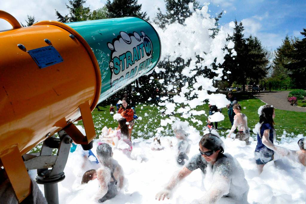 Sequim Gazette file photo by Matthew Nash
Strait Up Foam Fun, seen here in 2023, returns to Carrie Blake Community Park on Sunday, May 5 for Family Fun Days so children can play in the eco-friendly, biodegradable foam.