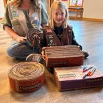 Photo courtesy Heidi Krzyworz/ Girls Scouts with Troop 45181 Skylar Krzyworz and Malta Bushy sit with finished cat scratchers at Kitty City in Sequim.