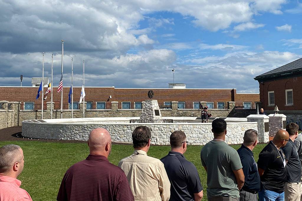Photo courtesy Chris Turner
Flags for National Fallen Firefighters Memorial Weekend (set for May 4-5) were delivered on April 10 with a ceremonial bell ringing and bagpipe music to recognize fallen firefighters from 2023, including Sequims Capt. Chad Cate. A candlelight and memorial service will be livestreamed May 4-5.