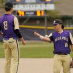 Sequim Gazette photo by Michael Dashiell / Sequim third baseman Ayden Holland, right, bounces the ball to his pitcher Ethan Staples in between innings of an April 24 league match-up with North Mason.