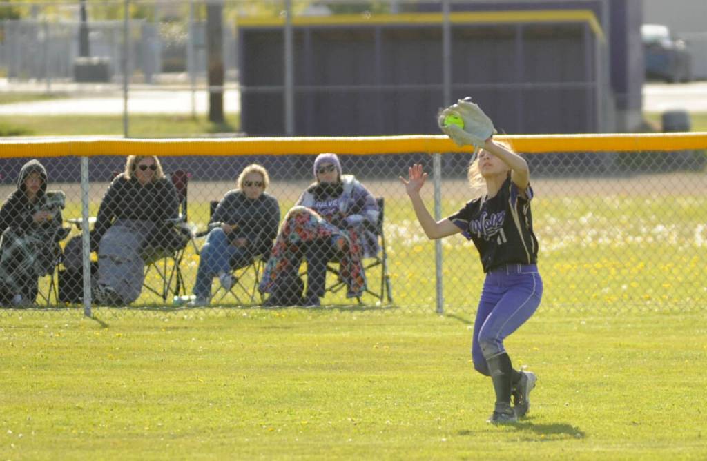 Sequim Gazette photo by Michael Dashiell / Sequim outfielder Kiley Winter snags a fly ball in the Wolves 11-7 loss to Bremerton on April 23.