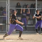 Sequim Gazette photo by Michael Dashiell / Sequims Mikki Green watches as her pop fly turns into a single in the Wolves Olympic League game against Bremerton on April 23.