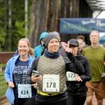 Kathryn Johnson of Oak Harbor (424), Sarah Wilson of Port Orchard (178) and Christine Thurston of Gig Harbor (123) take off at the beginning of the Sequim Railroad Bridge Run on April 27.