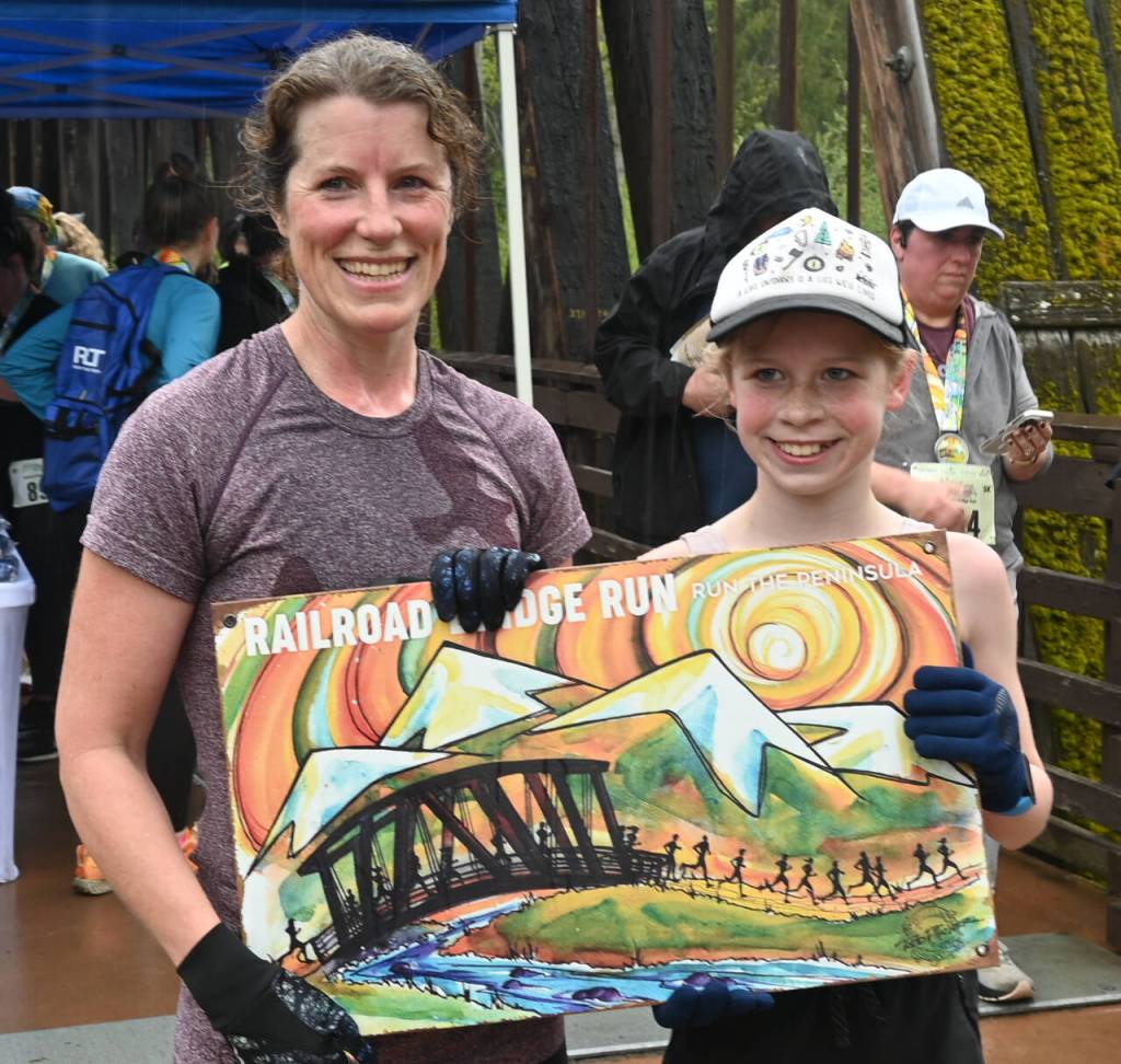 Sequim Gazette photo by Michael Dashiell / Sequim mother-daughter winners at the Sequim Railroad Bridge Run on April 27 are Laura Gould (10k) and Eleanor Jones (5k).