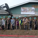 Staff from the North Olympic Library System (NOLS) join project partners at the groundbreaking of the Sequim Library expansion on Wednesday. Pictured, from left, are Kyle and Carrie Priest, owners of Hoch Construction; NOLS board members Jennifer Pelikan; Cyndi Ross and chair Mark Urnes; NOLS collection services manager Erin Shield, facilities manager Brian Phillips, executive director Noah Glaude and Sequim Library manager Emily Sly; Marlo Dowell of Acila Consulting; and Pia Westen and Adam Hutschreider of SHKS Architects. (Michael Dashiell/Olympic Peninsula News Group)