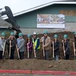 Staff from the North Olympic Library System (NOLS) join project partners at the groundbreaking of the Sequim Library expansion on Wednesday. Pictured, from left, are Kyle and Carrie Priest, owners of Hoch Construction; NOLS board members Jennifer Pelikan; Cyndi Ross and chair Mark Urnes; NOLS collection services manager Erin Shield, facilities manager Brian Phillips, executive director Noah Glaude and Sequim Library manager Emily Sly; Marlo Dowell of Acila Consulting; and Pia Westen and Adam Hutschreider of SHKS Architects. (Michael Dashiell/Olympic Peninsula News Group)