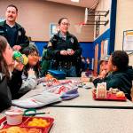 Photos courtesy Sequim Elementary PTA
Trooper Katherine Weatherwax with Washington State Patrol speaks to Helen Haller Elementary fourth graders at lunch about her job during Friend a First Responder Day.