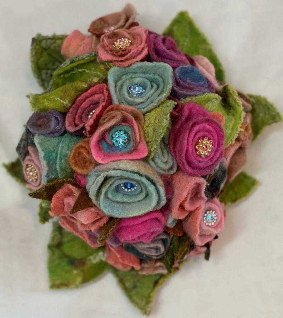 Photo courtesy of Lora Amstrong / Rose Bouquet by Lora Armstrong, one of 15 Peninsula Fiber Artists with work on display this month at the A. Milligan Art Studio & Gallery.