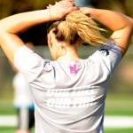 The North Peninsula Football Club womens teams motto, pictured on the back of Sequim High grad Olivia Hare, is emblazoned on the back of practice jerseys.