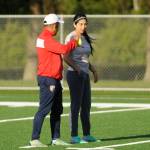 Sequim Gazette photo by Michael Dashiell / North Peninsula Football Club coach Juan Carlos Cisneros speaks with Lupita Pérez at a practice in Port Angeles on May 7.