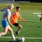 Sequim Gazette photos by Michael Dashiell
Jessica Haugen battles teammate Aimee Dennis for possession in a scrimmage at a North Peninsula Football Club practice in Port Angeles on May 7.