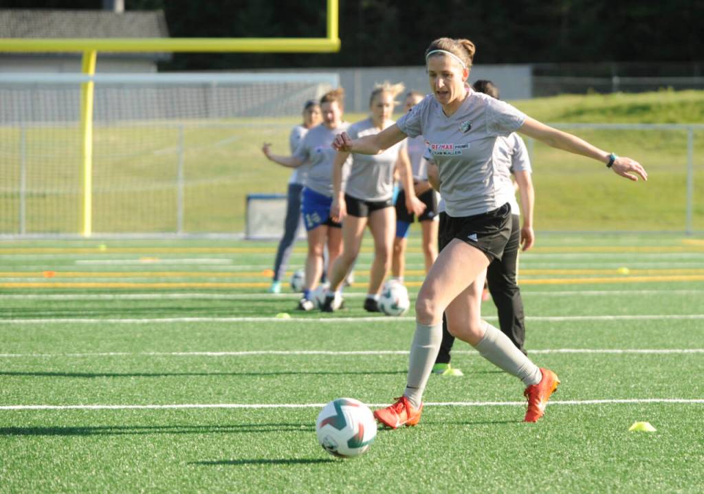 Sequim Gazette photo by Michael Dashiell / Amanda Anderson participates in a drill at a North Peninsula Football Club practice in Port Angeles on May 7.