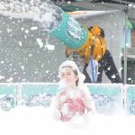 Rain or shine, many children, including 6-year-old Lila Richards enjoy Strait Up Foam Fun on May 5 during Family Fun Days. It was Lilas first time in the foam, her mom said.