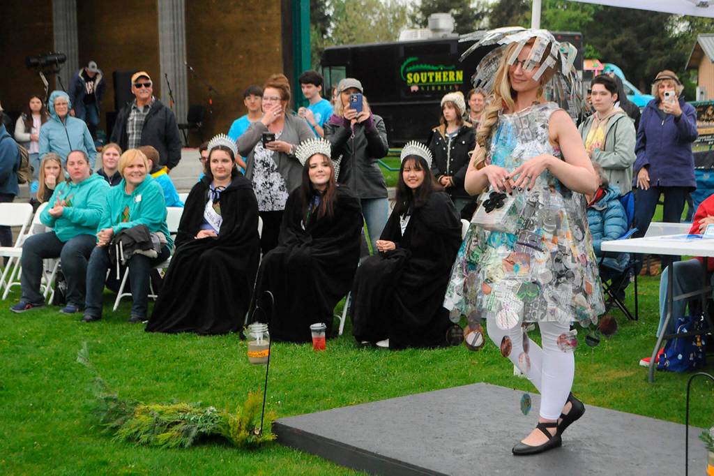 Sequim Gazette photo by Matthew Nash/ Hillarie Strong of Port Angeles models the second place winner Old School at the Trashion Show. It was designed by retired teacher Nancy Watts who used sheet protectors and transparencies sewn and glued on. Strong said she saw the event advertised on Facebook and wanted to try something new. I definitely had fun and Id do it again. It was very, very cool, she said.