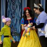 Sequim Gazette photo by Matthew Nash/ Sister and brother Mylee Beeter, 12, and Braylen Williams, 9, win the Grand Prize during the Kids Parade on May 4 with Princess Ashlynn Northaven giving them the ribbons for their Snow White and Dopey costumes. Theyll appear in the Grand Parade on May 11, and Mylee said she hopes to be on the royalty court someday.