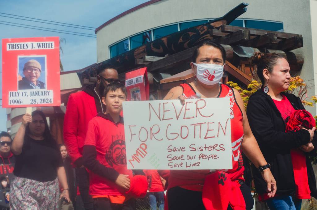 Sequim Gazette photo by Elijah Sussman / Red Dress Day marchers leave the Elwha Klallam Heritage Center, walking to raise awareness for missing and murdered indigenous people (MMIP) in Port Angeles on May 3.
