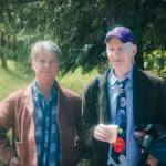 Sequim Gazette photo by Elijah Sussman / John Vaillant and Writer in Residency organizer Rich Riski shuffle-off campus to KONP interview on April 30.