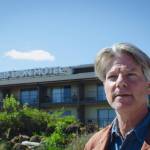 Sequim Gazette photo by Elijah Sussman / Author John Vaillant walks on Hollywood Beach, in front of Red Lion Hotel on May 2.