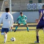 Sequim Gazette photo by Michael Dashiell / Sequim goalkeeper Nolan Valenzuela, center, keeps an eye on Bremerton attacker Adrian Ortiz, left, in the Wolves Olympic League home game on April 30. Bremerton edged the Wolves, 4-3.