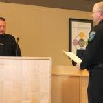 Photo courtesy City of Sequim/ New Sequim Police Deputy Chief John Southard is sworn in on May 1 by Police Chief Mike Hill in the Sequim City Council chambers.
