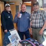Photo courtesy of Sarge’s Veteran Support / Sarge’s Veteran Support house managers (from left) Danny Deckert, David Durnford and Steve Elmelund welcome attendees to the organization’s first fundraiser at the Dungeness River Nature Center on April 27. The event raised nearly $50,000.