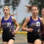 Sequim Gazette photo by Michael Dashiell
Sequims Dawn Hulstedt, left, and Kaitlyn Bloomenrader race to state berths in the 800-meter race at the West Central Bi-district meet in Belfair on May 18. Bloomenrader placed second in the heat and third overall while Hulstedt placed third in the heat and fourth overall.