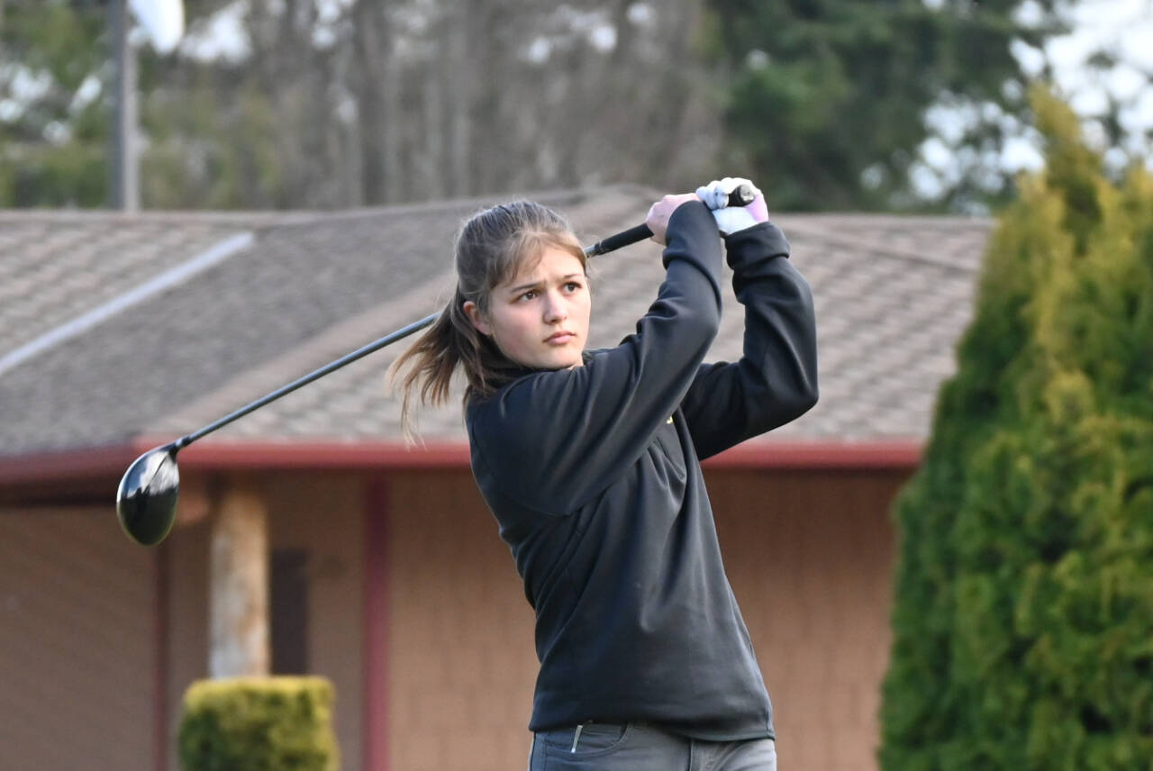 Sequim Gazette file photo by Michael Dashiell
Sequims Raimey Brewer tees off at the first hole at The Cedars at Dungeness in an Olympic League match against Bainbridge on March 21. Brewer qualified for the class 2A state golf tournament at a district tournament last week in Auburn.