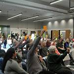 Sequim Gazette photo by Matthew Nash/ Sequim Prairie Tri-Irrigation Association shareholders vote to continue the February annual meeting and reinstate two board members.