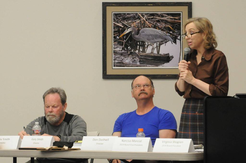 Sequim Gazette photo by Matthew Nash/ Virginia Shogren, right, said that the May 14 special meeting for the Sequim Prairie Tri-Irrigation Association cannot allow for election of new members, and that its only allowed at the February annual meeting. She, Don Dashiell, left, and Richard Moore (later appointed) were elected as board members at the annual meeting after they felt the 2023 meeting was invalid due to a lack of notifications, and the existing board left the 2024 meeting without adjourning and they needed a quorum to continue.