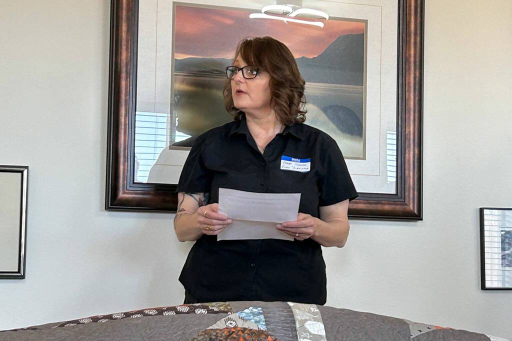 Sequim Gazette photo by Matthew Nash/ Cheri Tinker, executive director of Sarges Veteran Support, speaks at the dedication for LtCol James Minsky Place.