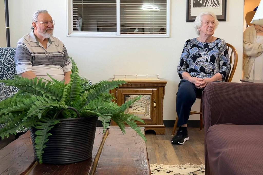 Sequim Gazette photo by Matthew Nash/ Greg and Helen Starr, executors of James Minskys estate, listen to Cheri Tinker, executive director of Sarges Veteran Support, speak about the new permanent housing for disabled/ elderly veterans.