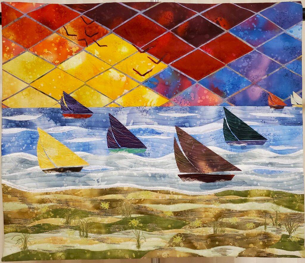 Photo courtesy of Peninsula Fiber Artists / “Sail Away” is a pieced and thread-painted art quilt created by Nordland’s Susan Sawatzky.