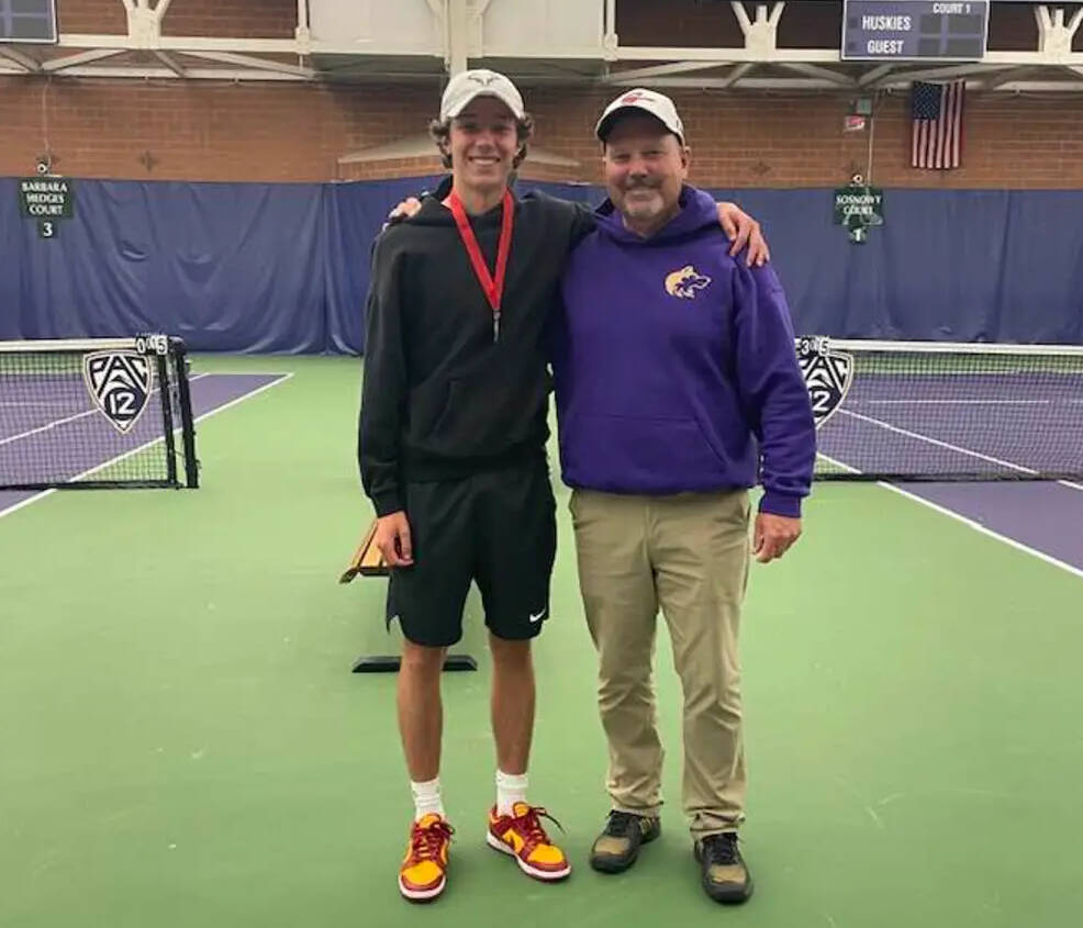 Photo courtesy of Caryn Little
Sequims Garrett Little, left, celebrates a second place finish at the 2A state tennis tournament in Seattle this past weekend with Sequim head coach Mark Textor.