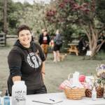 Photo by Zion Hilliker 
SisterLand Farm employee Eli Smith enjoys a previous Pride Picnic in June 2022.