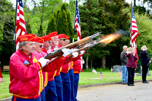 Photo by Peter Segall/Olympic Peninsula News Group / Members of the Mount Olympus Detachment 897 of the Marine Corps League give a 21-gun salute at a Memorial Day ceremony at Mt. Angeles Memorial Park in Port Angeles on May 27. The ceremony was hosted by the Veterans of Foreign Wars Post 6787 of Carlsborg and was one of many Memorial Day events held in Clallam and Jefferson counties.