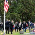 Sequim Gazette photo by Matthew Nash/ Members of the Veterans of Foreign War Post 4760 and American Legion Jack Grennan Post 62 give a silent salute during a Memorial Day ceremony on May 27 in Sequim View Cemetery honoring those lost while serving in the U.S. armed forces.