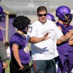 Sequim Gazette file photo by Michael Dashiell / Sequim High head coach Erik Wiker leads his football squad in a preseason practice in August 2017.