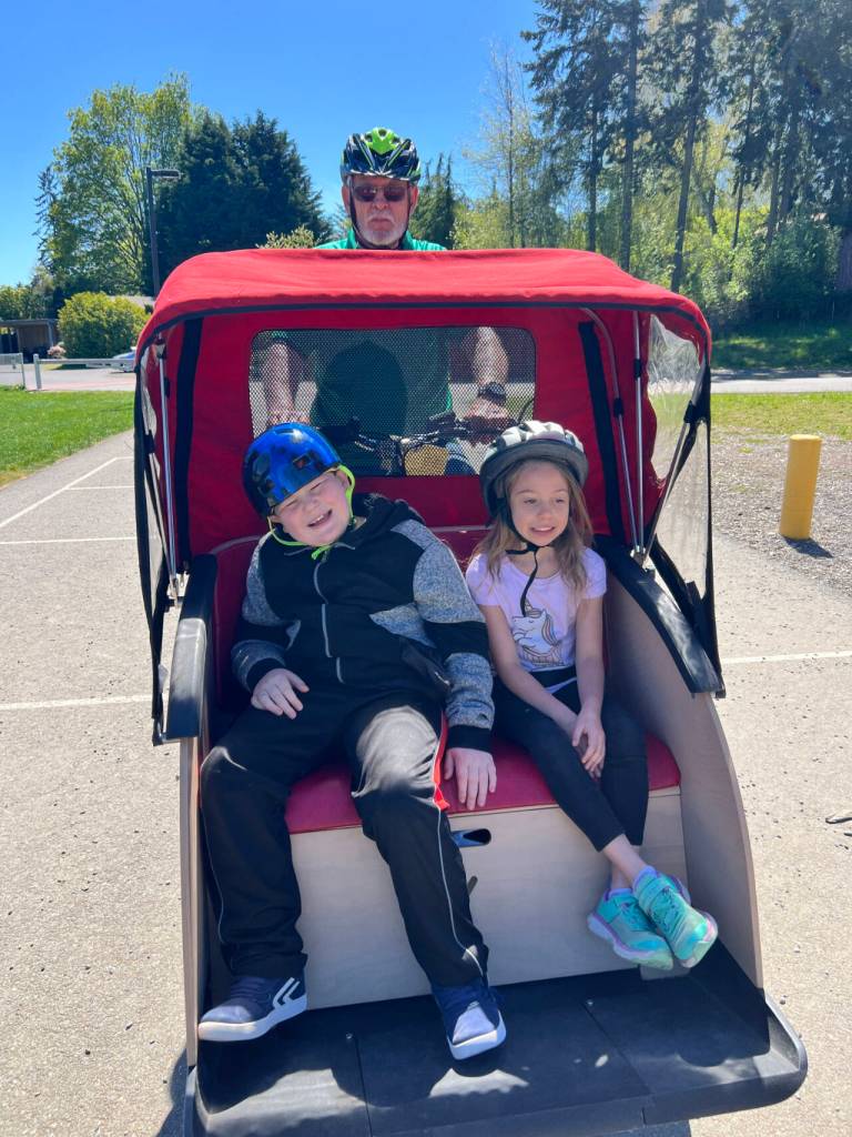 Photos courtesy of Sequim Wheelers
Volunteers from Sequim Wheelers offer rides and speak with students at Salish Coast Elementary School in Port Townsend in April.