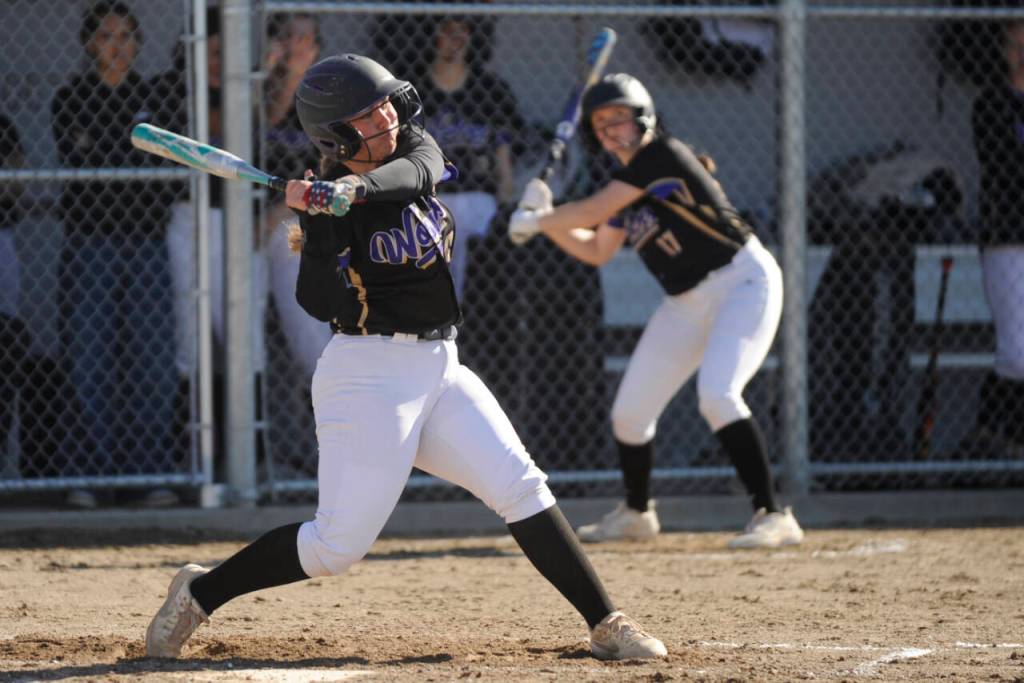 Sequim Gazette photo by Michael Dashiell / Sequims Mikki Green looks to rip into a pitch as the Wolves host North Mason on April 30. She was named to the all-Olympic League first team this spring.