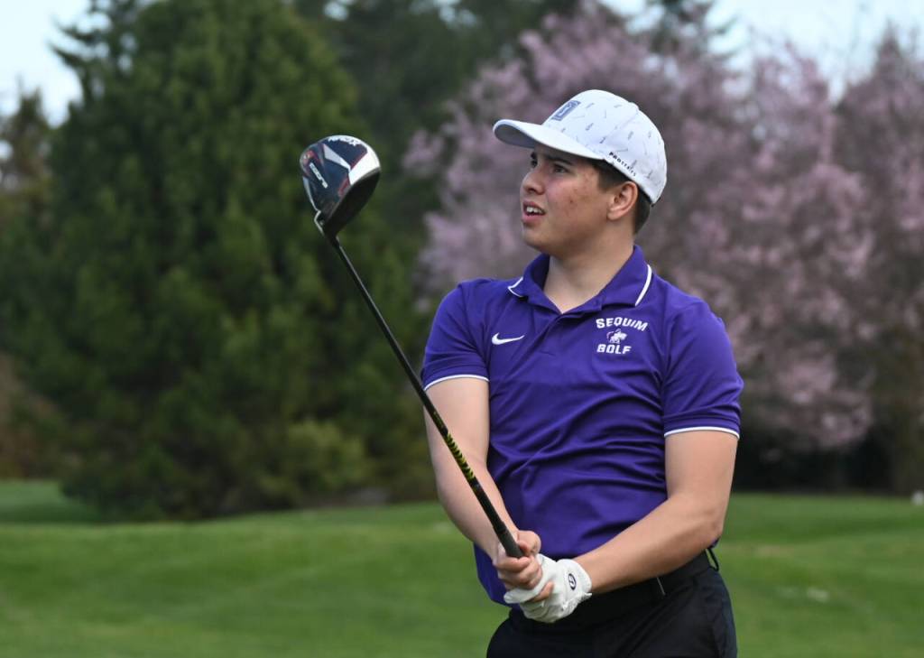Sequim Gazette photo by Michael Dashiell / Sequims Adrian Aragon watches a drive in a March 21 match against Bainbridge at home on March 21. Aragon was named to the all-Olympic League first team.