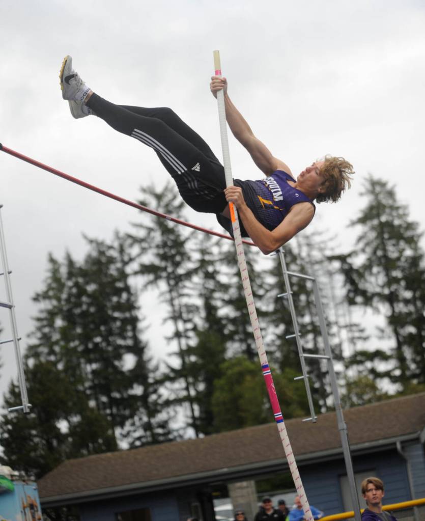 Sequim Gazette photo by Michael Dashiell / Sequims Ari Skov clears the pole vault bar at the West Central Bi-district meet in Belfair on May 18. Skov, who won the event with a 12-9 mark and qualifed for the class 2A state meet, was named to the all-Olympic League first team.