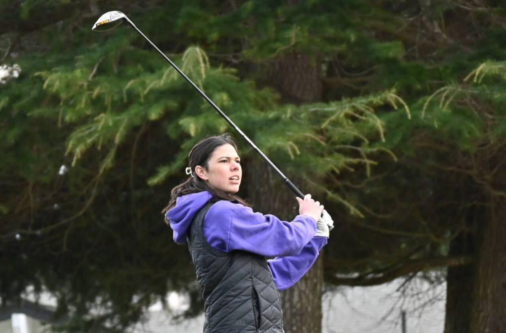 Sequim Gazette photo by Michael Dashiell / Sequims Emily Post looks for a spot on the fairway at The Cedars at Dungeness on March 21 as the Wolves take on Bainbridge. Post,who qualified for the class 2A state tourney in May, was named to the all-Olympic League first team.