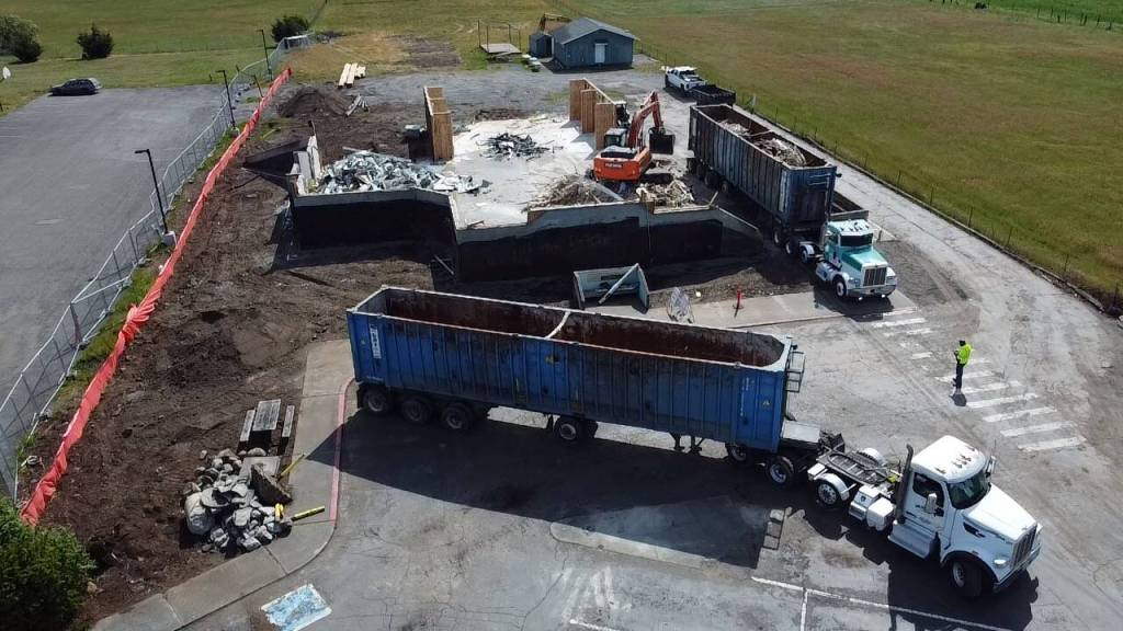 Photo courtesy of Hoch Construction
An aerial photo shows Hoch Construction workers clearing most of the Sequim Library structure away for a major expansion project to be completed by spring 2025.