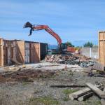 Photo by Noah Glaude/North Olympic Library System / Workers with Hoch Construction remove much of the structure at the Sequim Library location at 630 N. Sequim Ave., in preparation for the major expansion project.