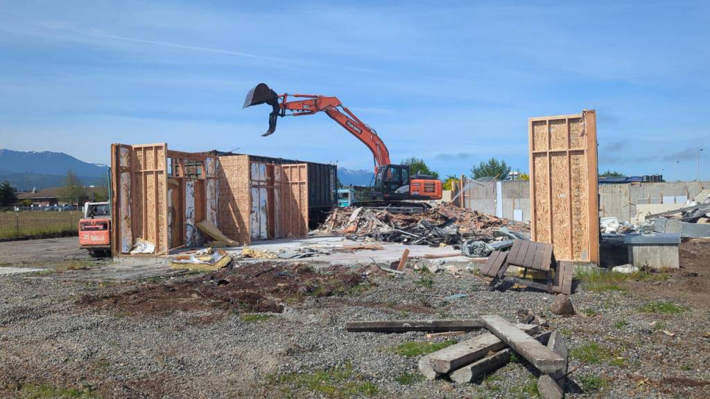 Photo by Noah Glaude/North Olympic Library System / Workers with Hoch Construction remove much of the structure at the Sequim Library location at 630 N. Sequim Ave., in preparation for the major expansion project.
