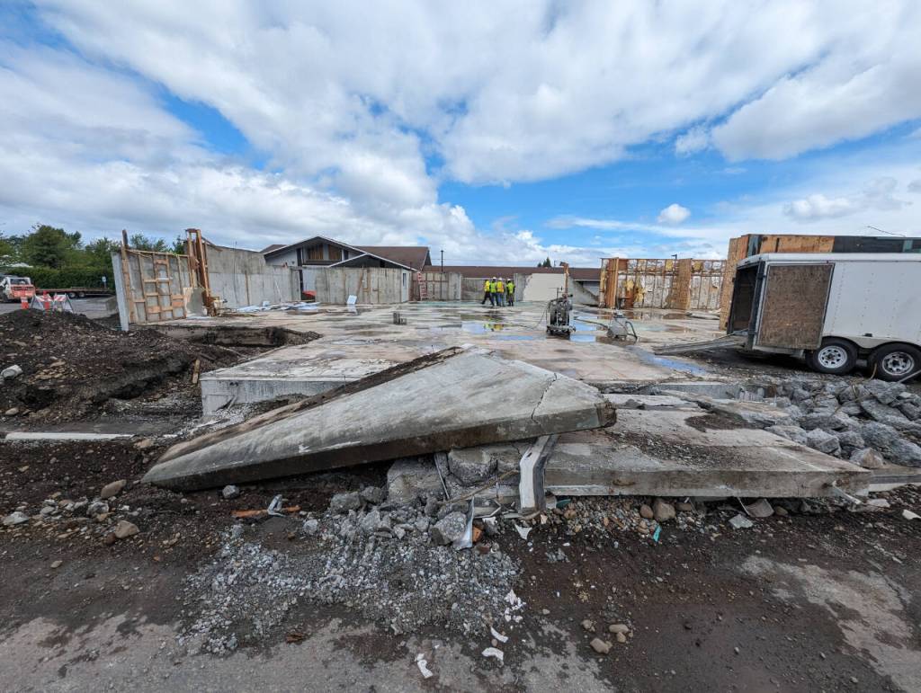 Photo by Noah Glaude/North Olympic Library System / Workers with Hoch Construction remove much of the structure at the Sequim Library location at 630 N. Sequim Ave., in preparation for the major expansion project.