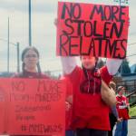 Sequim Gazette photo by Elijah Sussman / Sisters and Jamestown Sklallam members Sonni (left) and Jolie Creech of the Johnson family show their support for MMIP at the Civic Feild parking lot on May 3.
