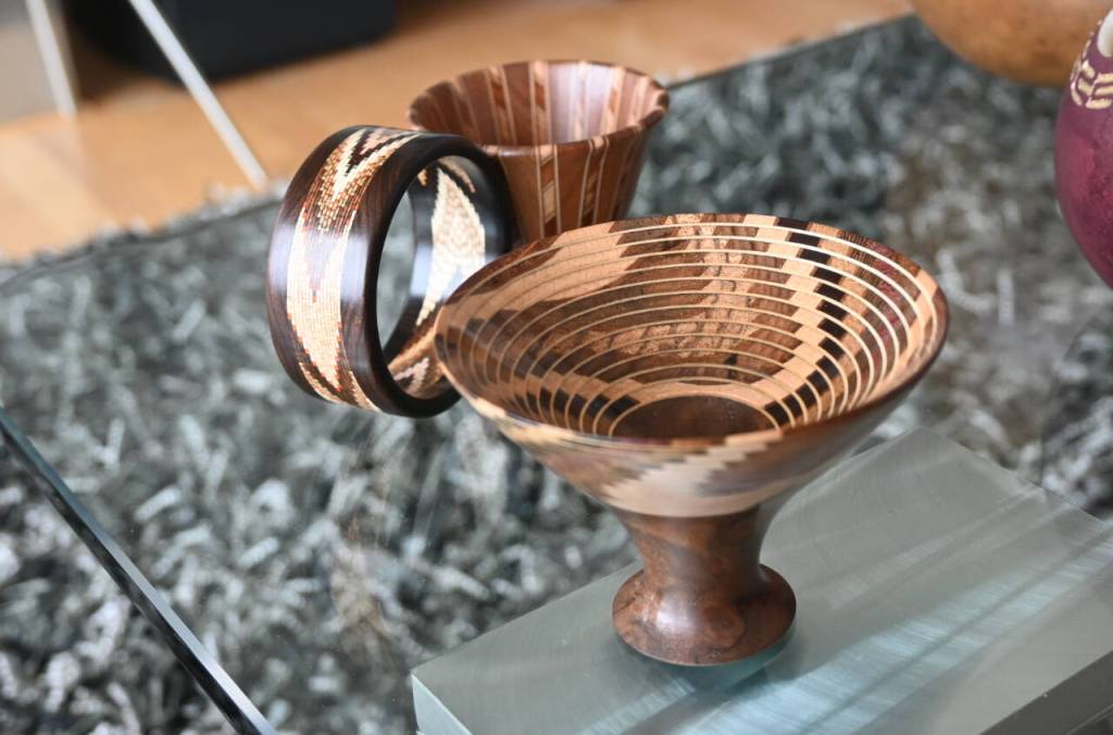 Sequim Gazette photo by Michael Dashiell / Woodturner Martha Collins uses mostly naturally-colored woods for her intricate pieces of art.