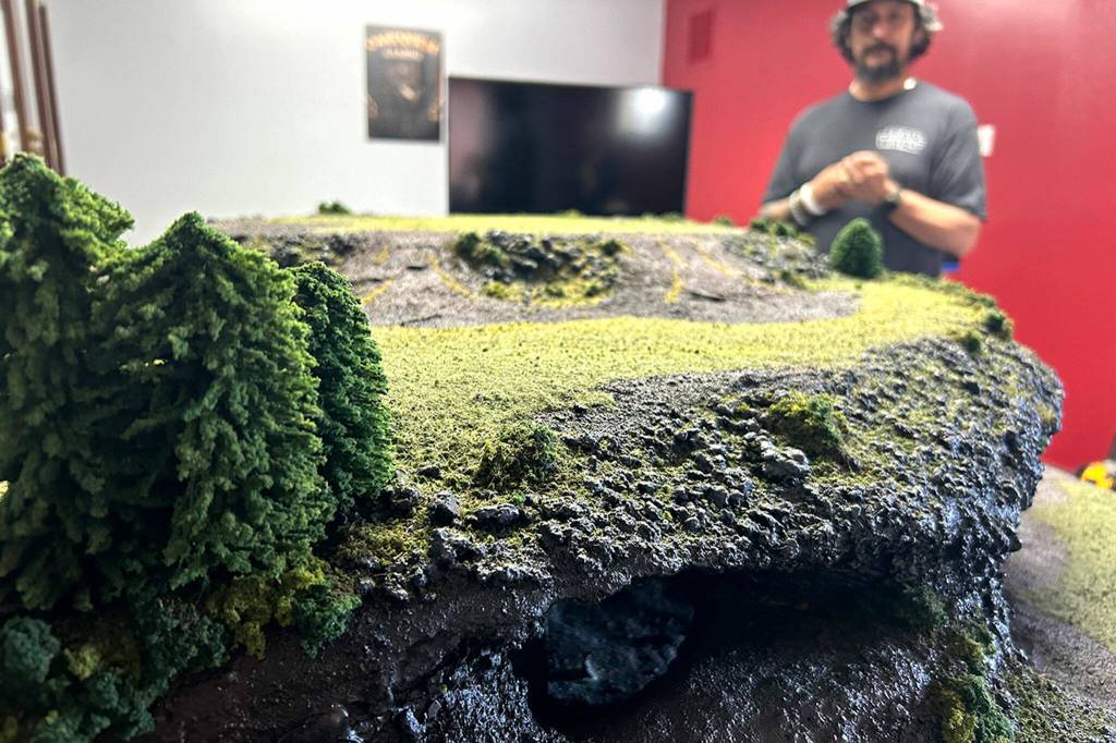 Sequim Gazette photo by Matthew Nash/ Local customers created this terrain and have it on display for tabletop game use in Cardquest Gaming in Sequim. Its also for sale.